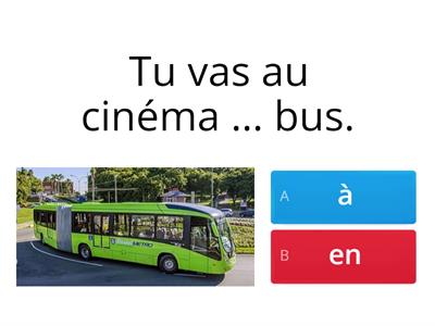 Aller à / en