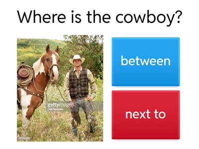  Next to, between