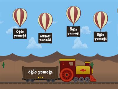 'Öğle yemeği' yazılan balonları patlatınız.