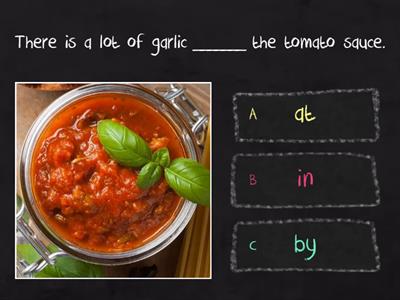 Prepositions of place: at, in, by. 